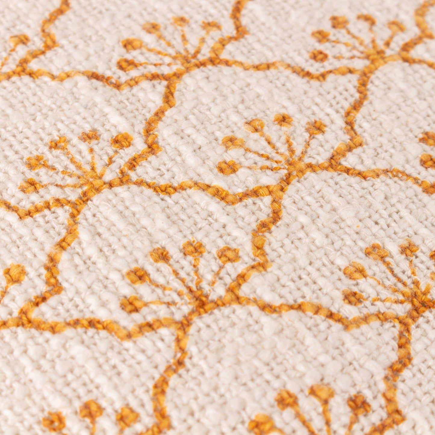 Boho tassel cushion in ecru and mastard