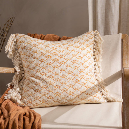 Boho tassel cushion in ecru and mastard