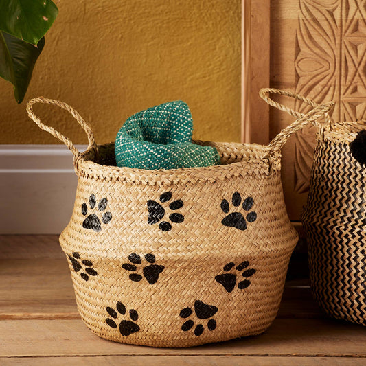 pet storage basket with paw print design made with woven seagrass